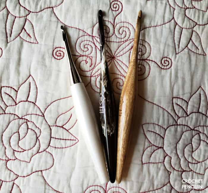  My own  ergonomic crochet hooks - Furls Odyssey Nickel and White Streamline Cafe and Streamline Teak  In addition to being eye catching they have beautiful balance.