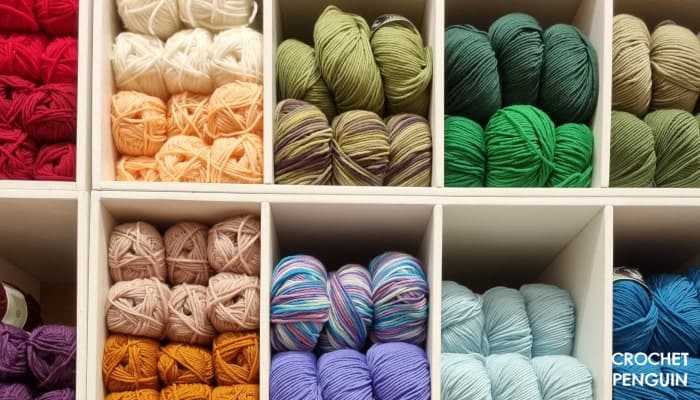 Lighted Hooks  reviews guide - image of multicolored yarn skeins on white shelving